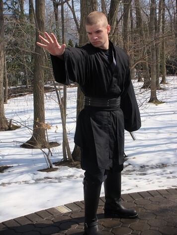 Christopher in his black cotton Sith ensemble